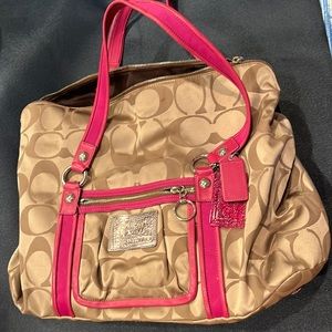 large Coach tote. Brown and magenta. Used, excellent condition.